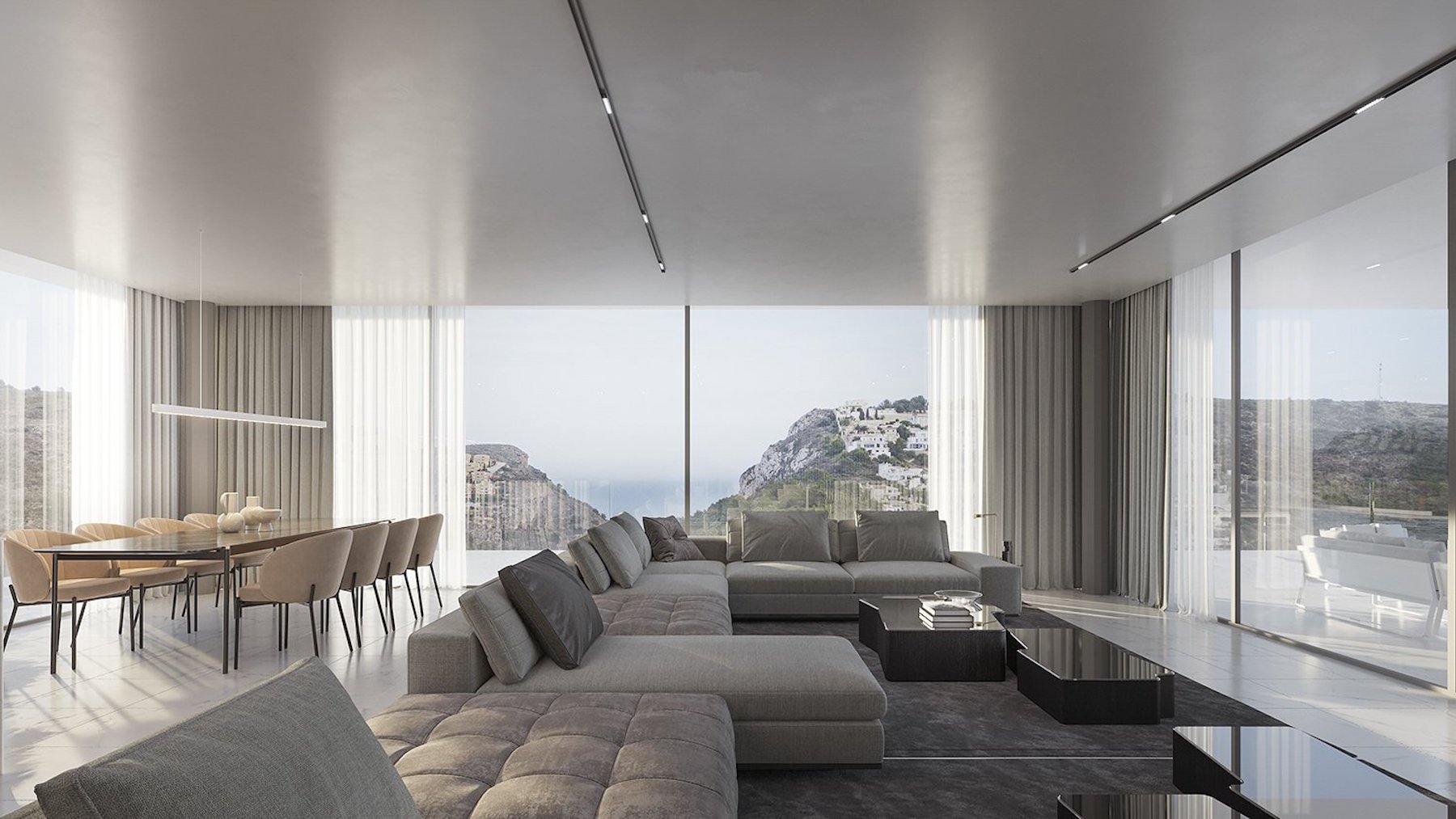 Open-plan living and dining area featuring floor-to-ceiling windows with coastal views, minimalist furniture, and recessed track lighting on a seamless ceiling.