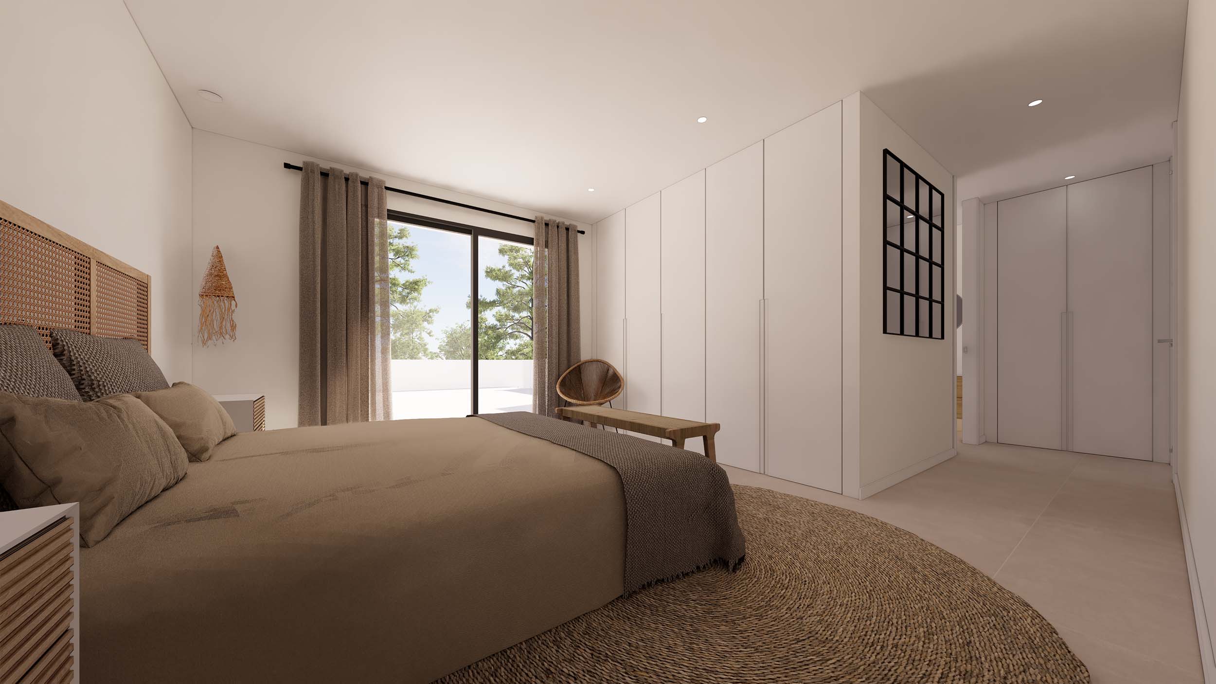 Ibizan-style bedroom featuring floor-to-ceiling wardrobes, a rattan headboard, and large sliding doors opening onto a private terrace.