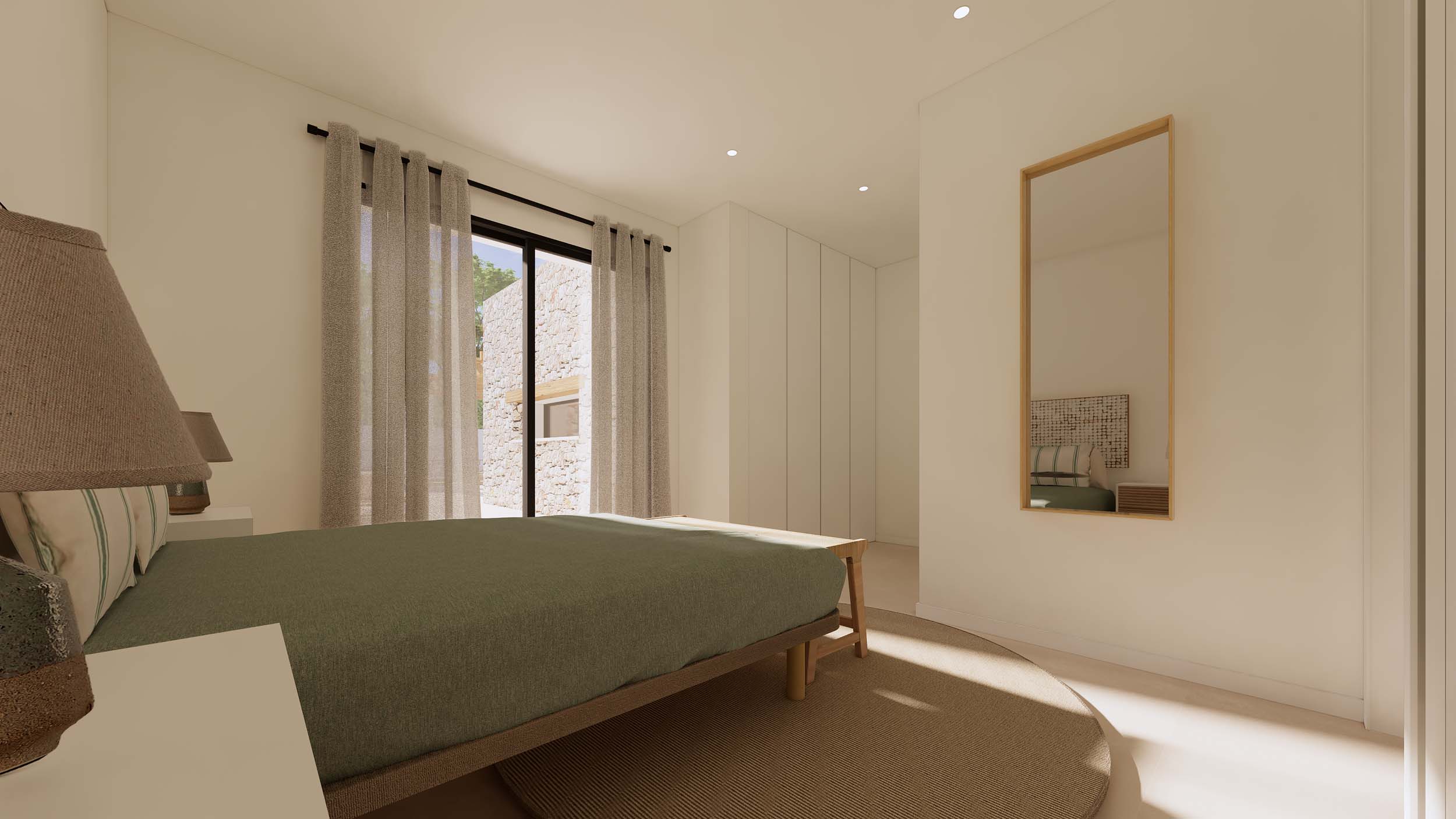 Minimalist bedroom featuring a wooden bed frame, circular jute rug, and white built-in wardrobes. Large sliding doors lead to an exterior with natural stone walls.