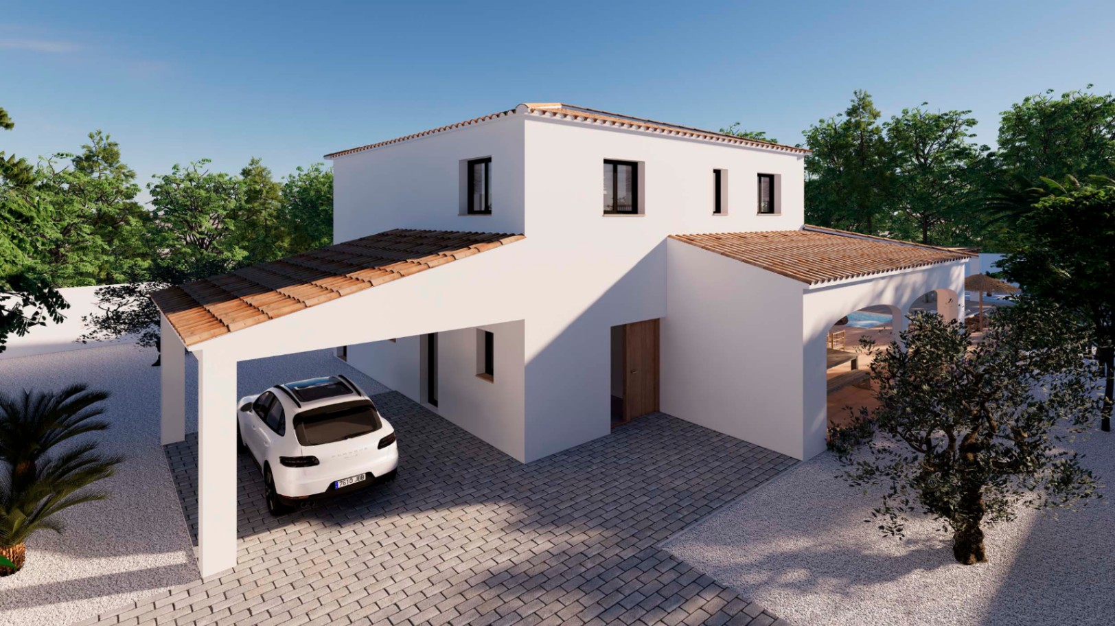Exterior view of the white villa featuring traditional terracotta roof tiles, a covered carport, and a paved driveway surrounded by gravel and trees.