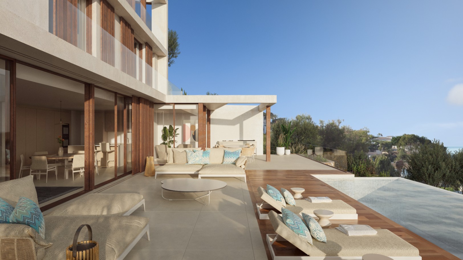 Main terrace featuring an outdoor lounge, sunbeds on wooden decking, and an infinity pool. Floor-to-ceiling glass doors integrate the interior with the Mediterranean exterior.