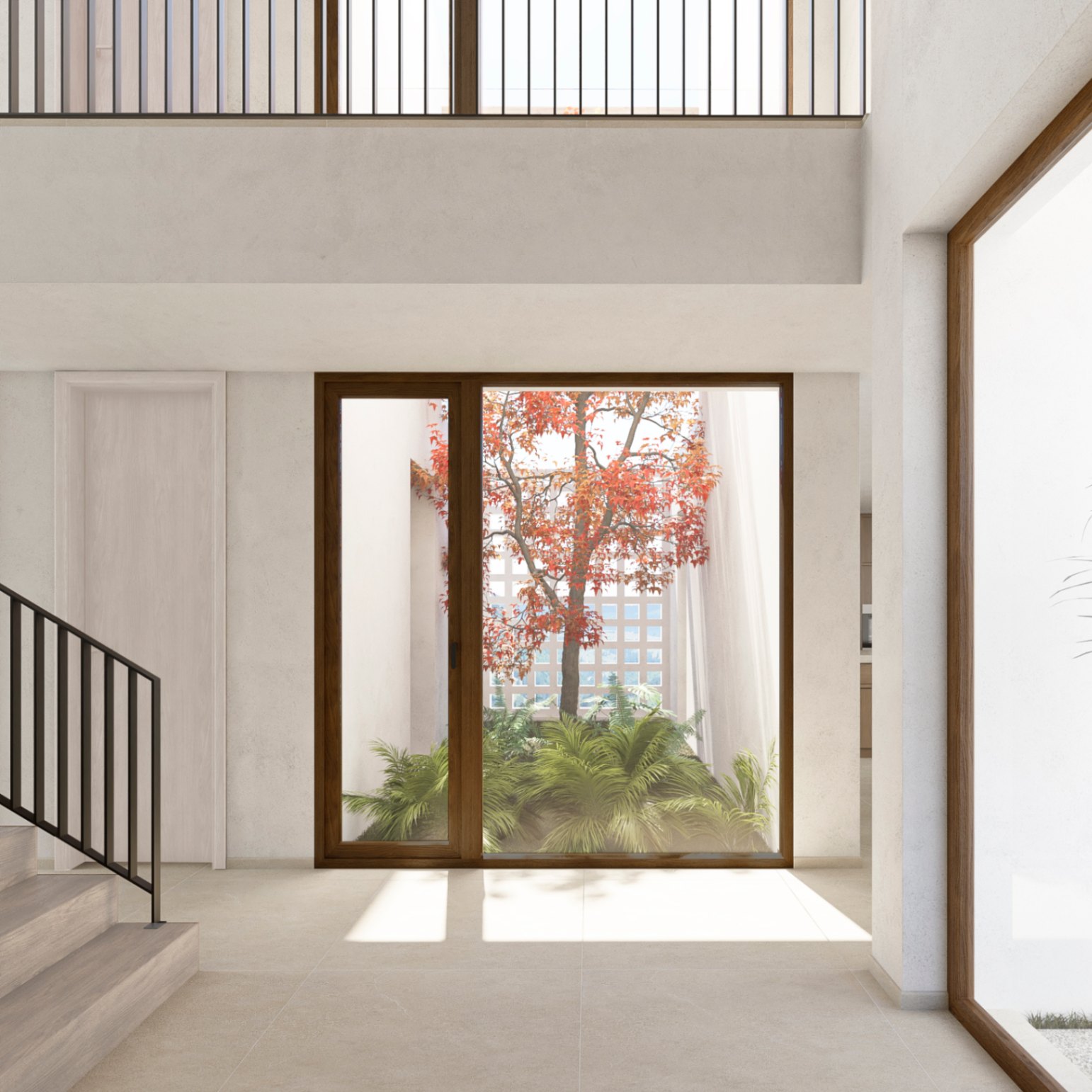 Interior view of the villa featuring a wood staircase and a window overlooking an interior garden with a reddish-leaved tree.