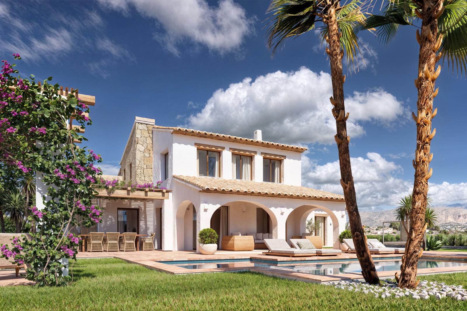 Villa exterior featuring an arched porch, swimming pool with sun loungers, and an outdoor dining area under a wooden pergola, framed by palm trees and stone walls.