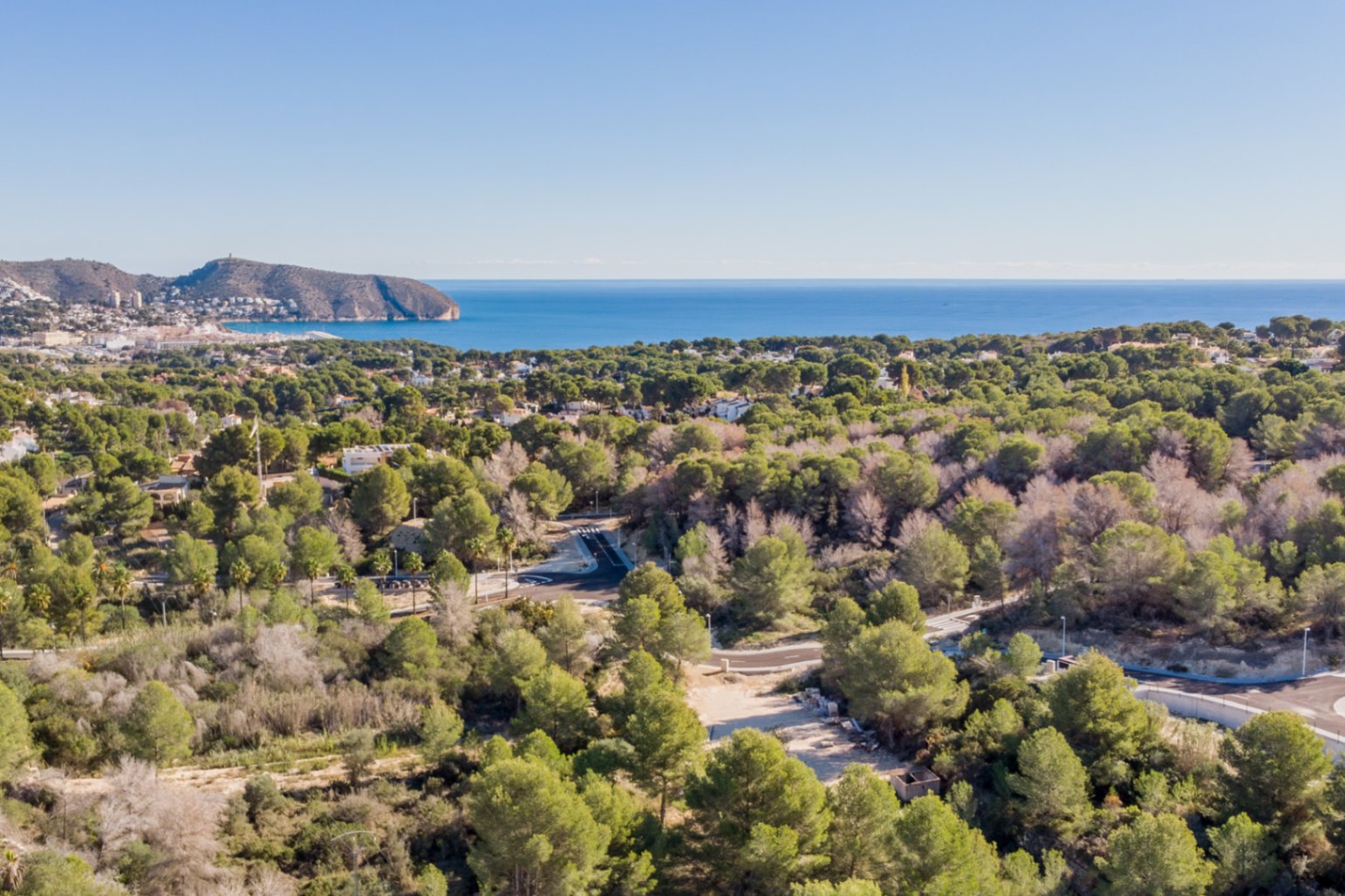 Panoramic views of the Mediterranean Sea and Cap d'Or, overlooking a protected pine forest that ensures a natural, private, and unobstructed environment.