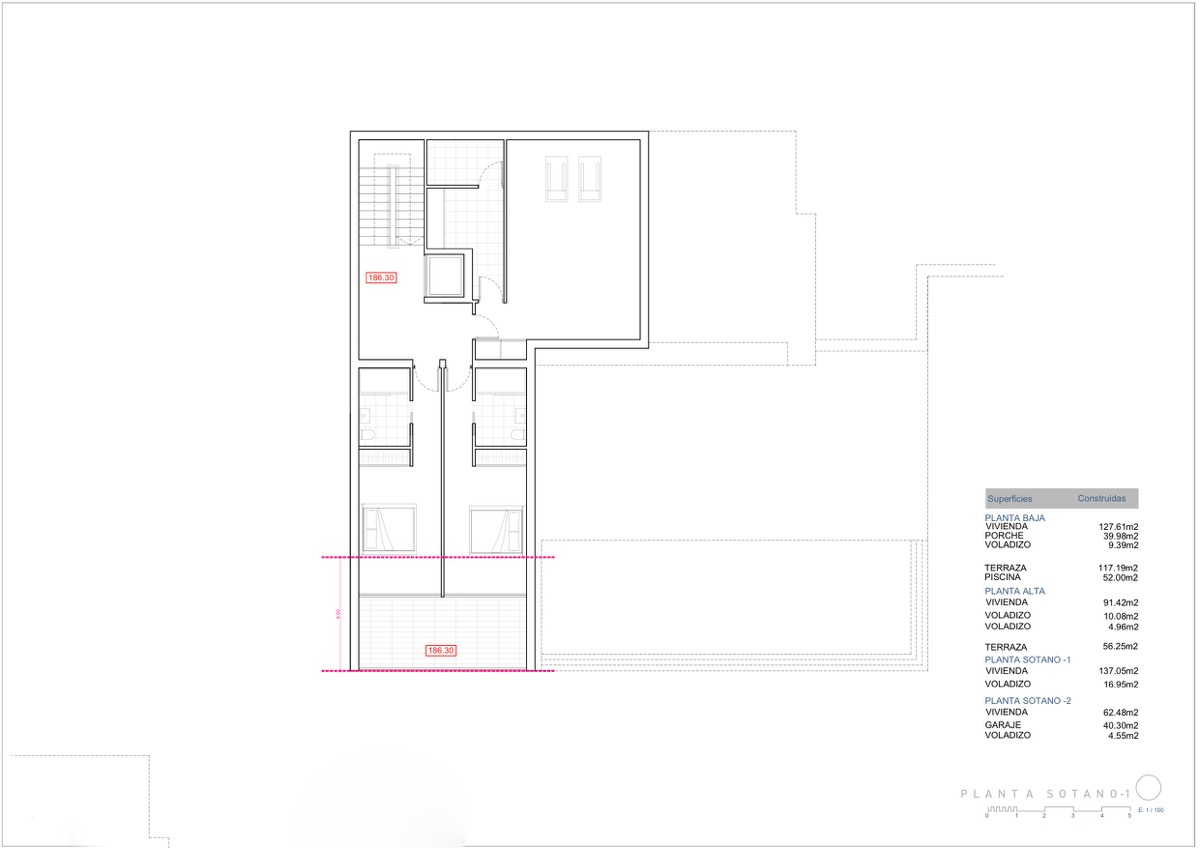 Technical floor plan of basement level -1, detailing two en-suite bedrooms, a dedicated gym space, and the central elevator and staircase access.