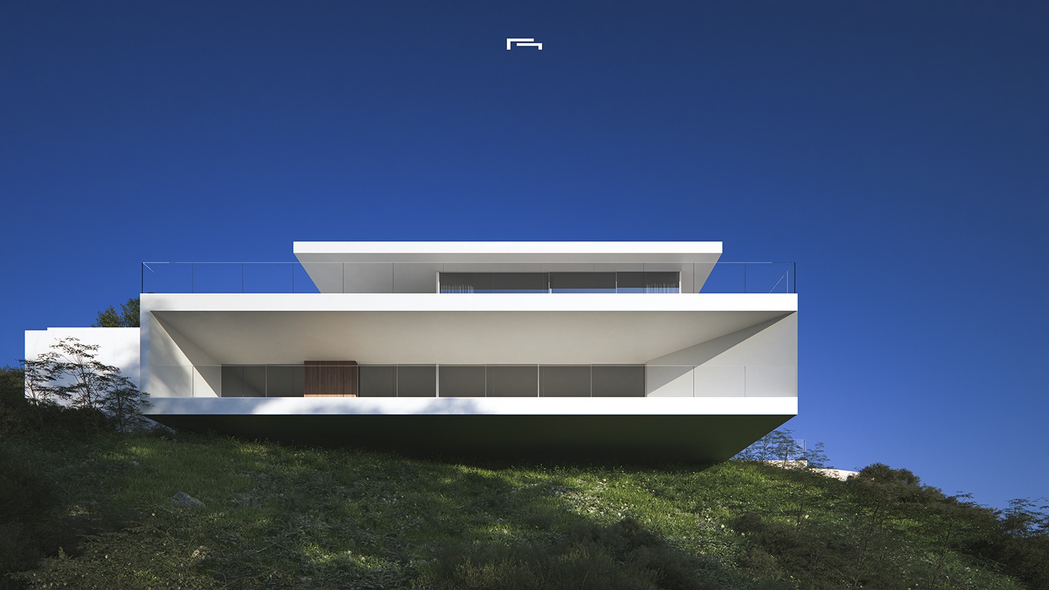 Exterior facade featuring minimalist white cantilevered structures, large glass panels, and glass railings, set on a green hillside under a clear blue sky.