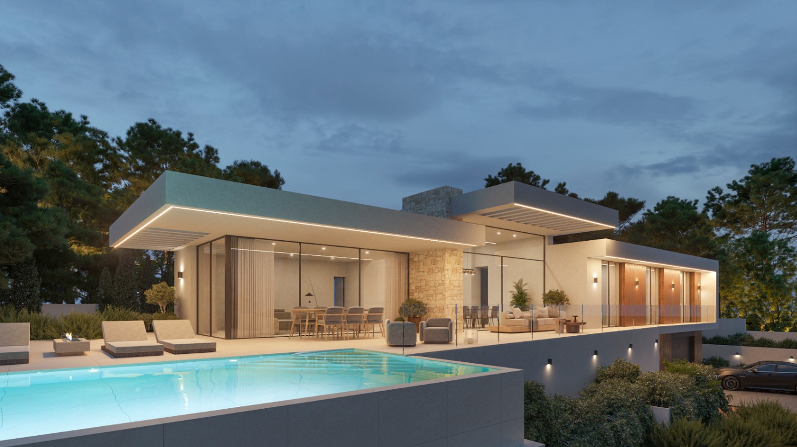Dusk view of the villa featuring an infinity pool, expansive terraces with integrated LED lighting, and a modern facade with natural stone accents.