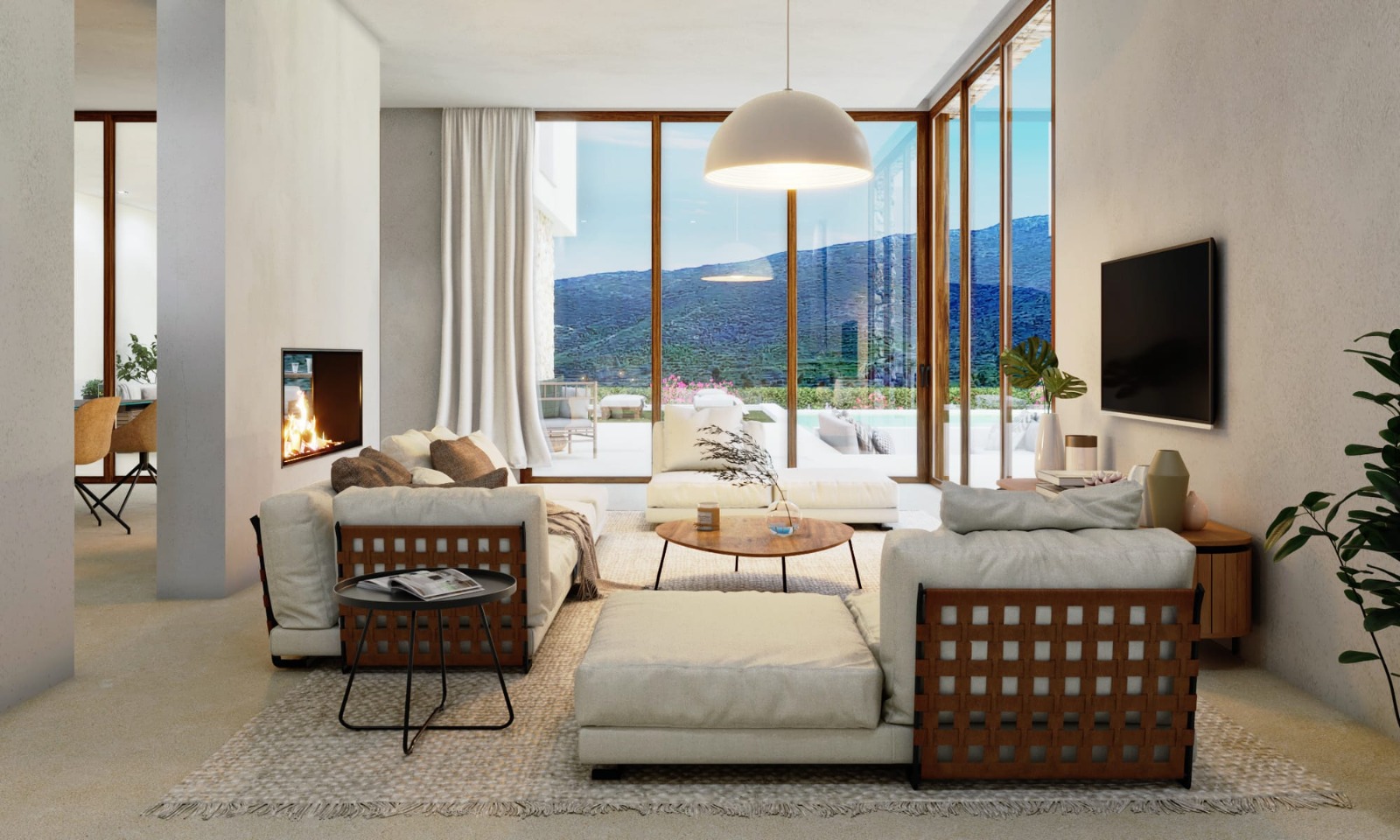 Bright living area featuring a recessed fireplace, designer modular seating, and floor-to-ceiling wooden-framed windows overlooking the mountains and pool.