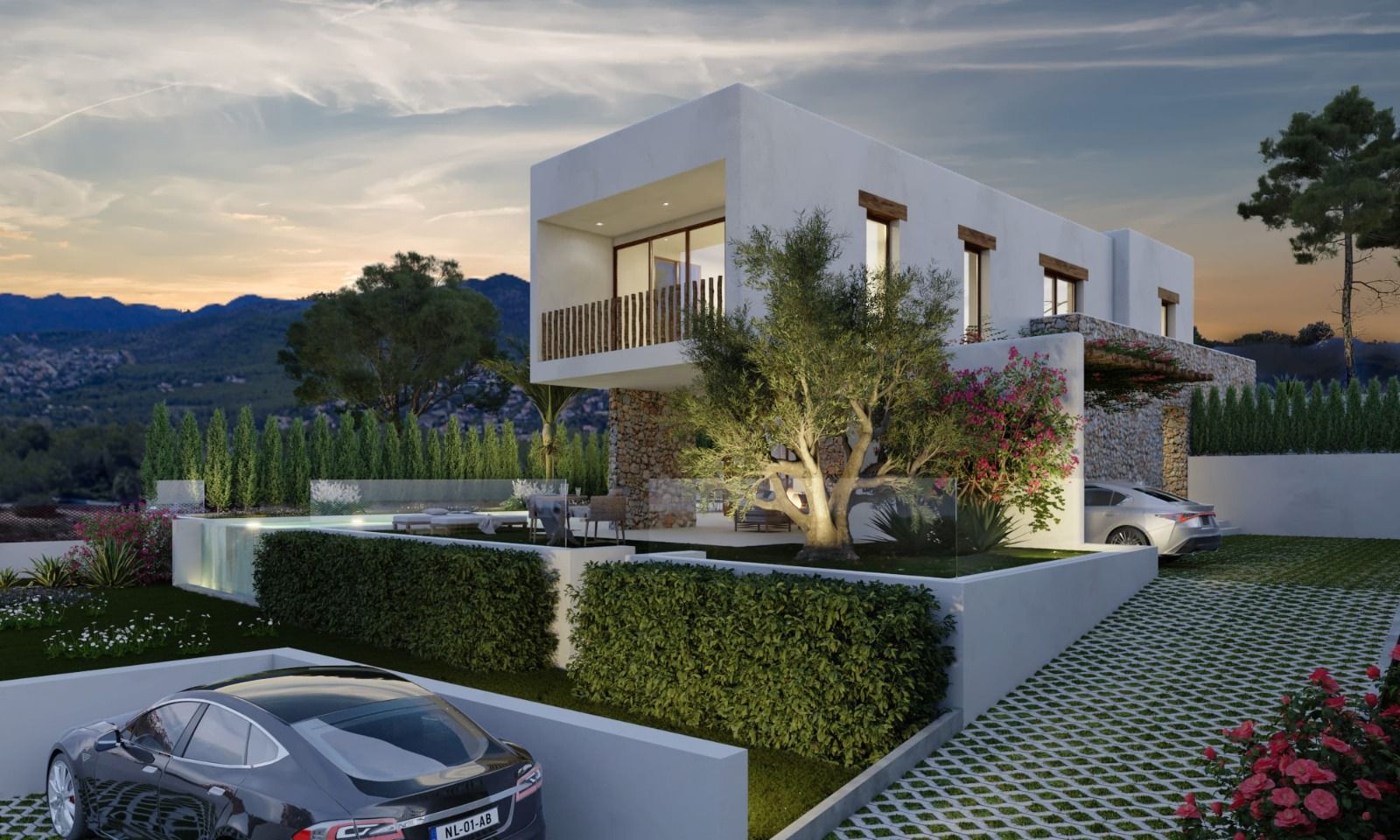Exterior view of the Ibizan-style villa featuring natural stone walls, white facades, and a landscaped garden with an illuminated olive tree and infinity pool.