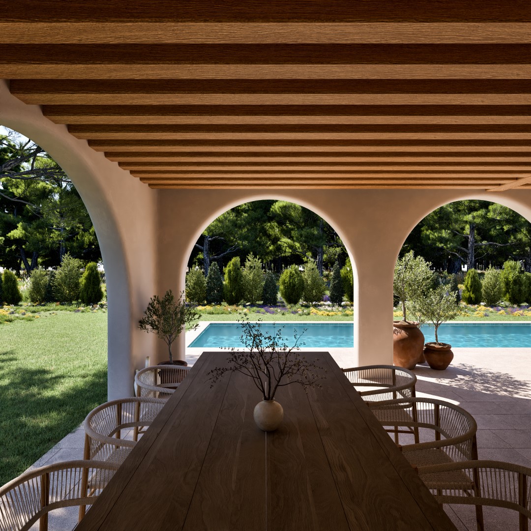 Covered terrace featuring Mediterranean arches, a wooden beam ceiling, and an outdoor dining area overlooking the private pool and landscaped garden.