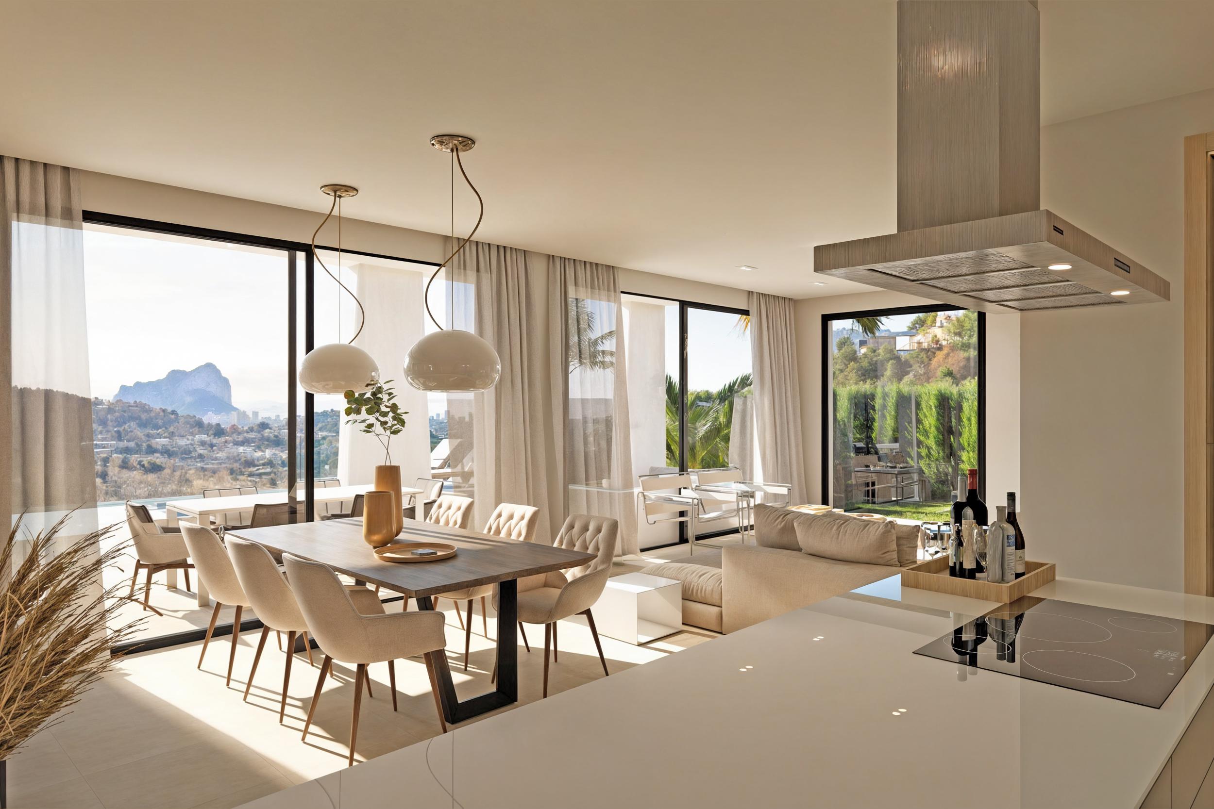 Bright living-dining area with a wooden table and views of Peñón de Ifach.