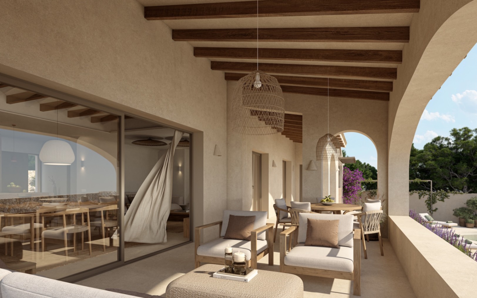 Covered porch featuring exposed wooden beams, wicker pendant lights, and neutral lounge furniture, seamlessly connected to the interior via large sliding glass doors.