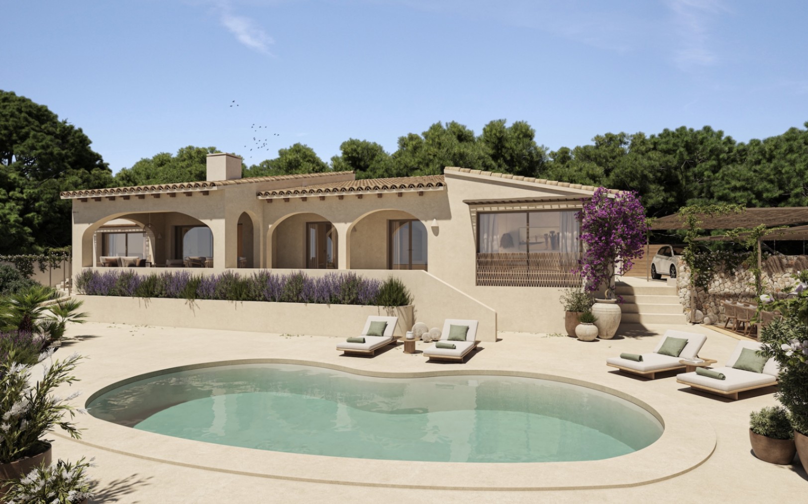 Exterior view featuring an organic-shaped pool, spacious sun terrace with loungers, and a Mediterranean facade with arched porches and lavender borders.