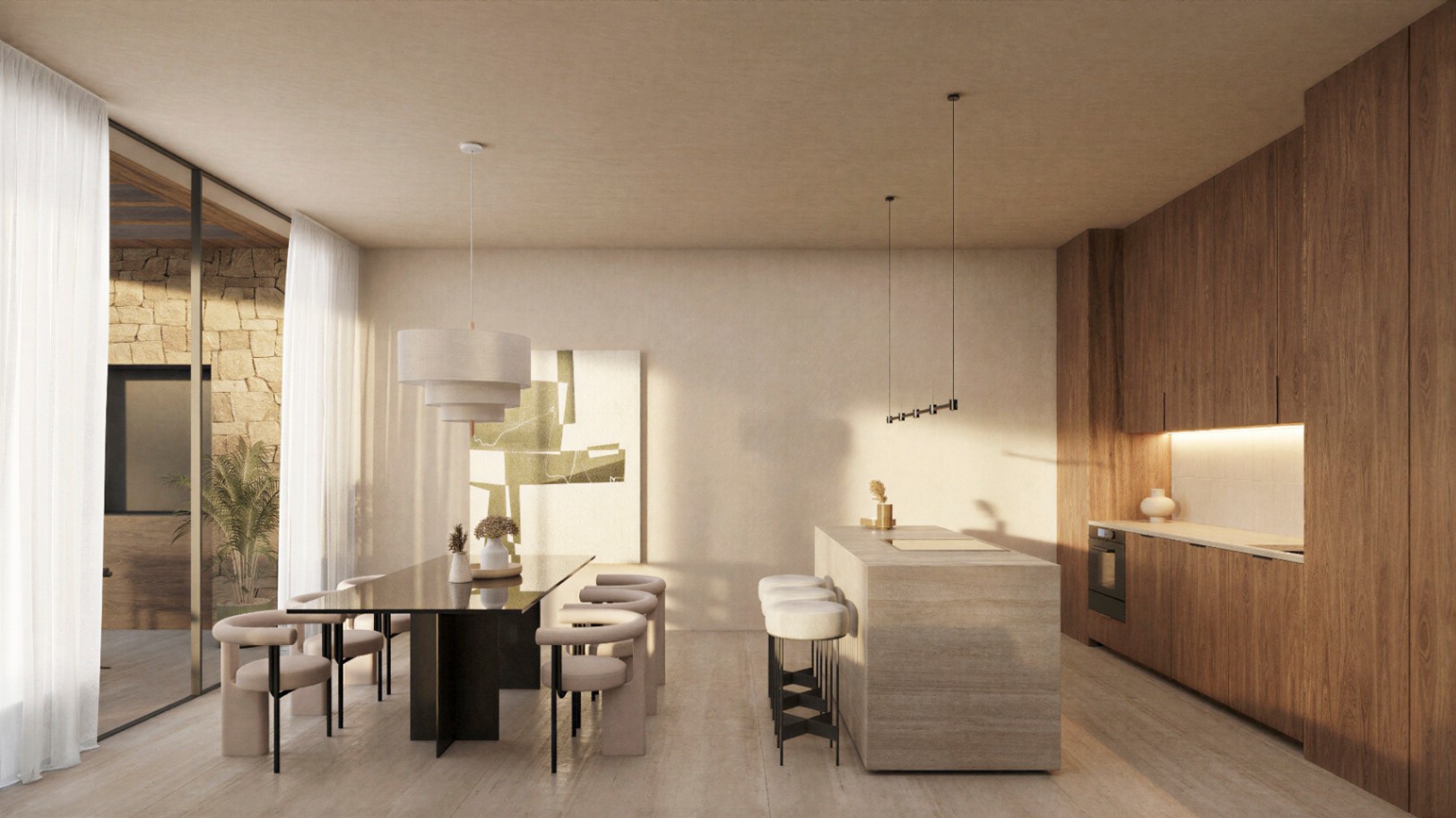 Designer kitchen featuring a natural stone island and wooden cabinetry, flowing into a dining area with modern furniture and access to a stone-walled patio.
