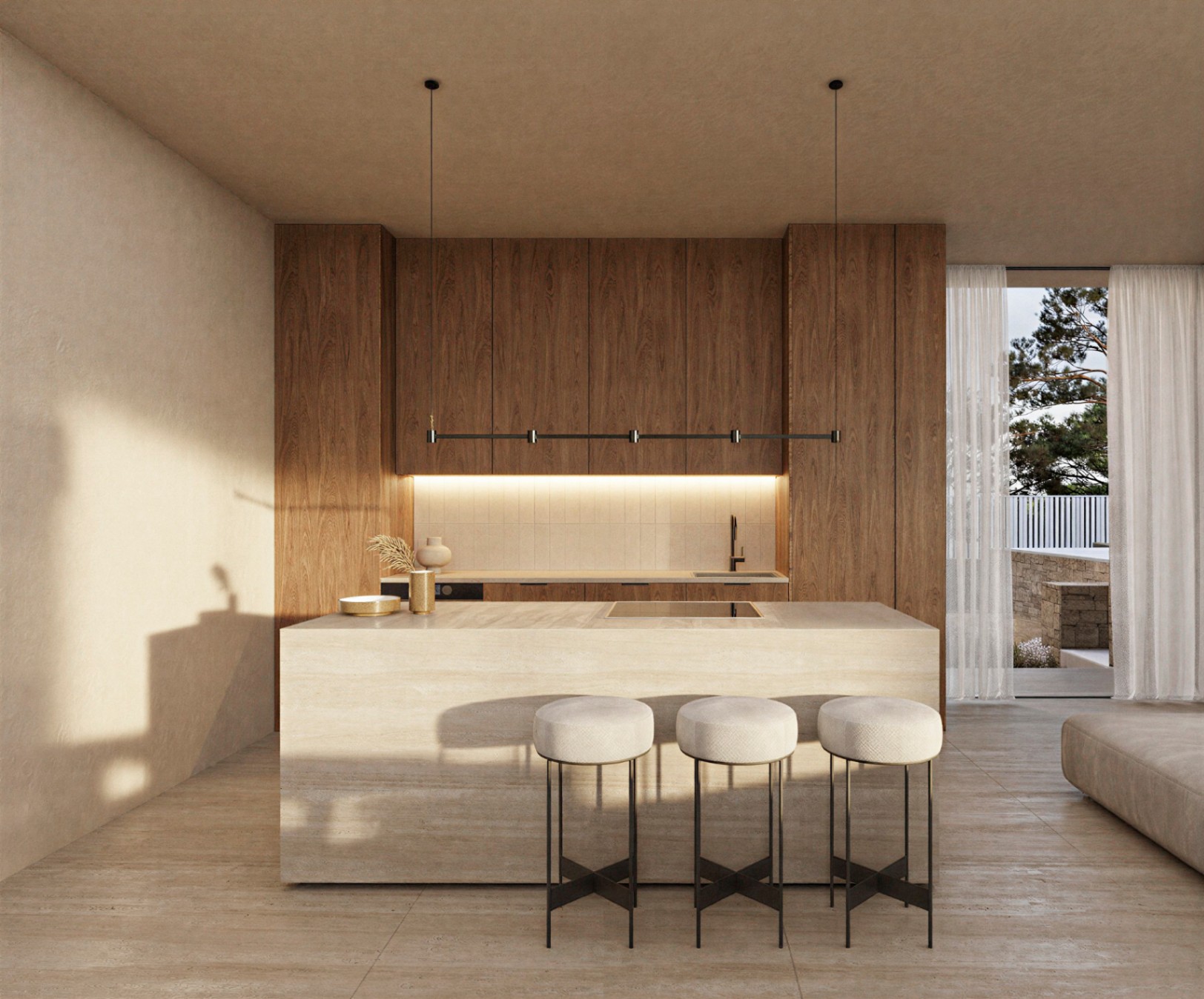 Designer kitchen featuring a natural stone island with integrated cooktop, walnut cabinetry, and minimalist pendant lighting. Warm neutral tones enhance the elegant space.