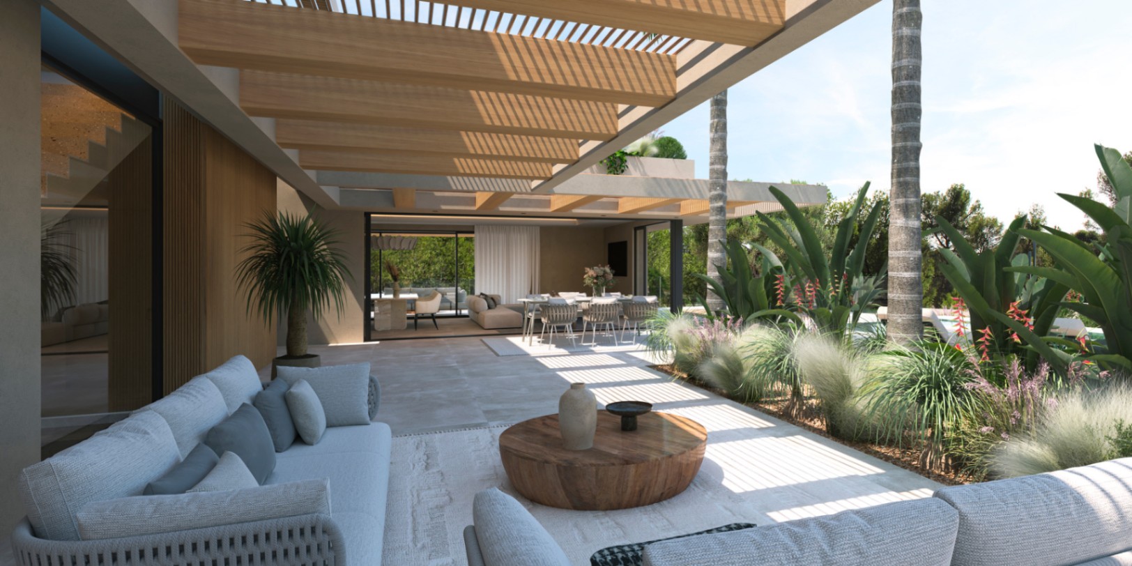 Covered terrace featuring a wooden slat pergola and stone flooring, seamlessly connecting the outdoor lounge to the interior living area via sliding glass doors.