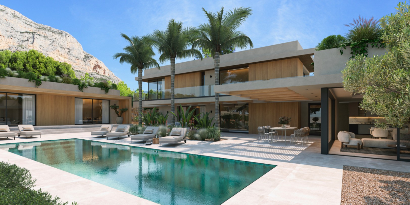 Modern villa exterior showcasing a rectangular pool, wood-paneled facades, and integrated landscaping with the Montgó mountain backdrop.