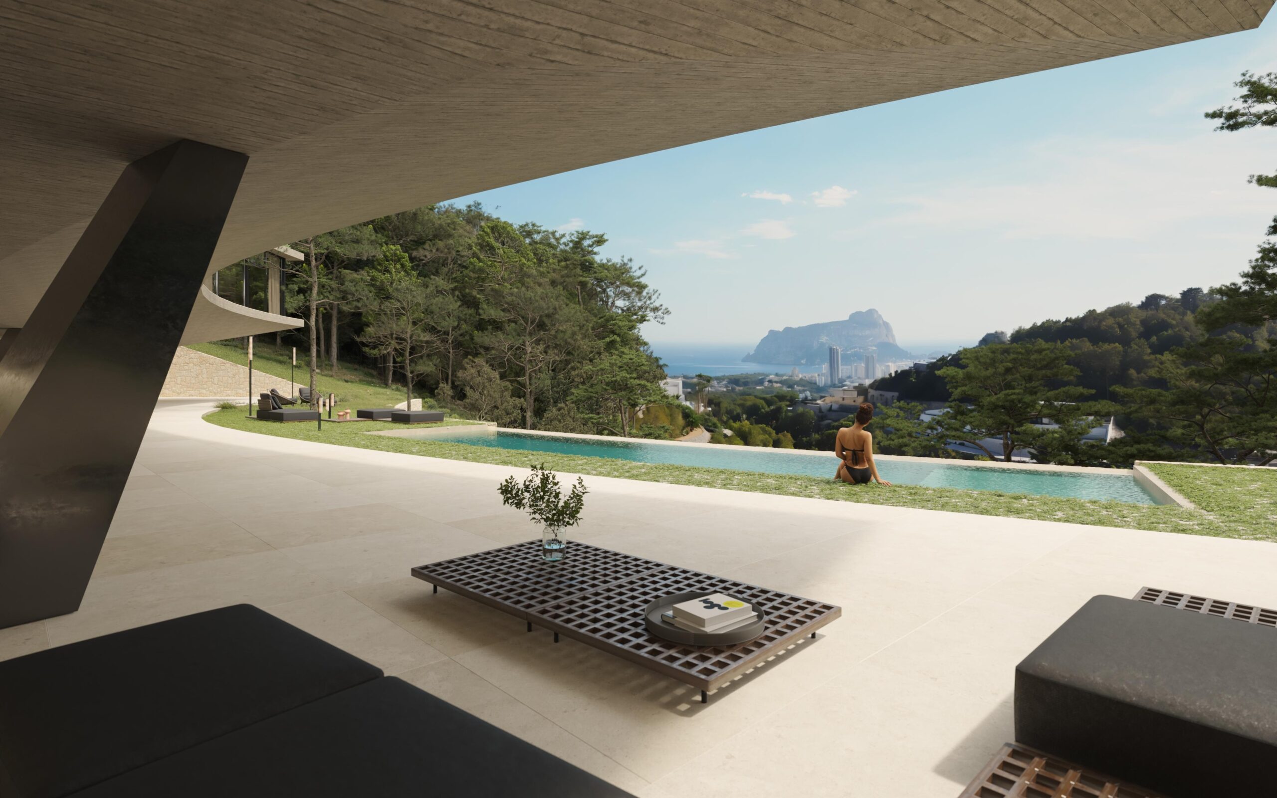Modern terrace featuring a cantilevered concrete ceiling, an infinity pool, and panoramic views of the Peñón de Ifach and the Mediterranean coast.
