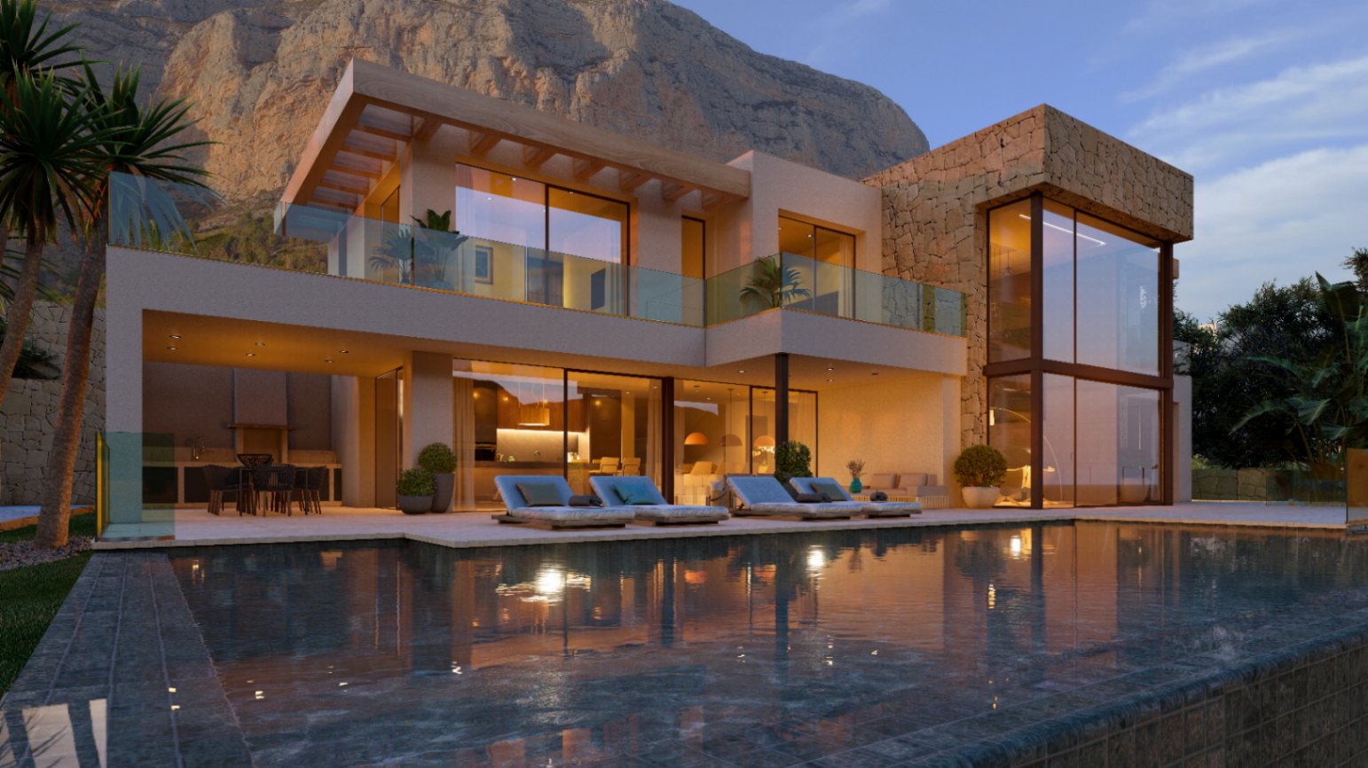 Modern villa exterior featuring a large pool, natural stone walls, and floor-to-ceiling windows, set against the backdrop of the Montgó mountain at dusk.