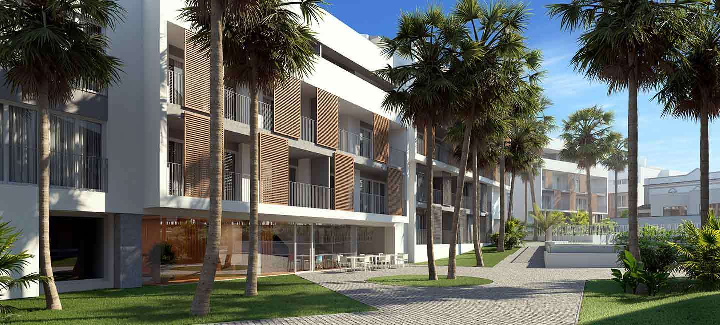 Modern exterior featuring white facades with wooden balcony shutters, landscaped gardens with mature palm trees, and a ground-floor social area.