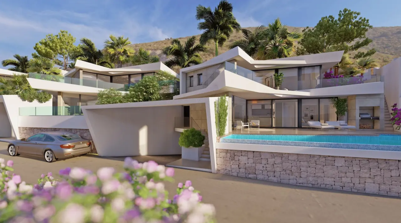 Modern multi-level villa featuring an angular white facade, infinity pool with a stone retaining wall, and integrated outdoor barbecue area amidst palm trees.