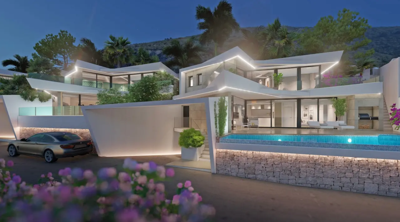 Modern multi-level villa featuring geometric white architecture, integrated LED lighting, an infinity pool, and natural stone walls against a mountain backdrop.