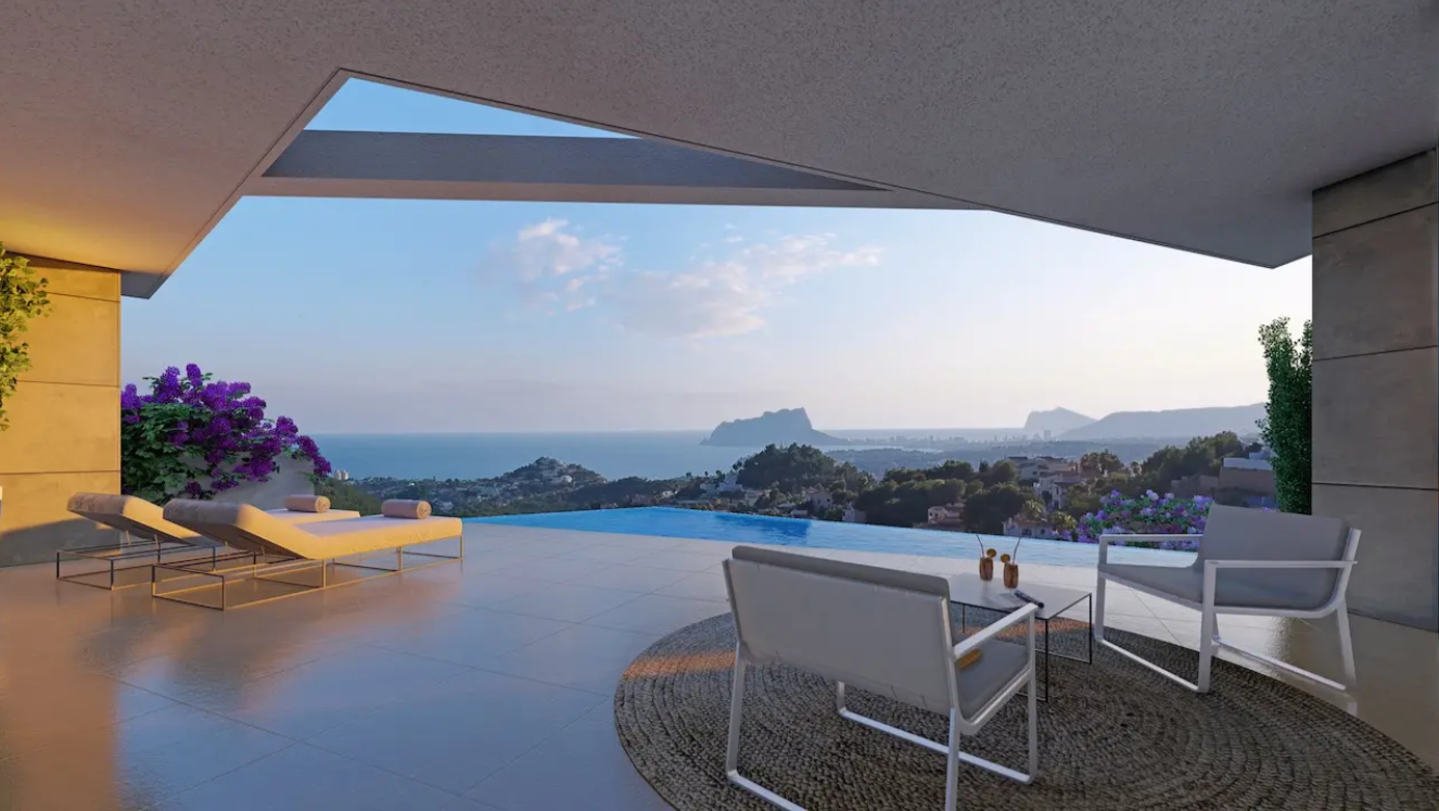 Terrace featuring an infinity pool and panoramic views of the Mediterranean and Peñón de Ifach. Includes modern loungers and a covered lounge area with stone cladding.