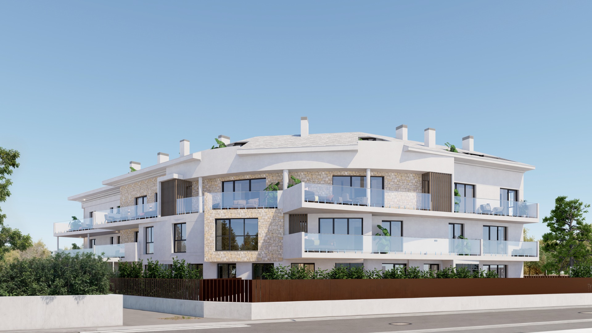 Exterior view of the three-storey building featuring a white facade with natural stone accents, curved glass terraces, and dark-framed windows.