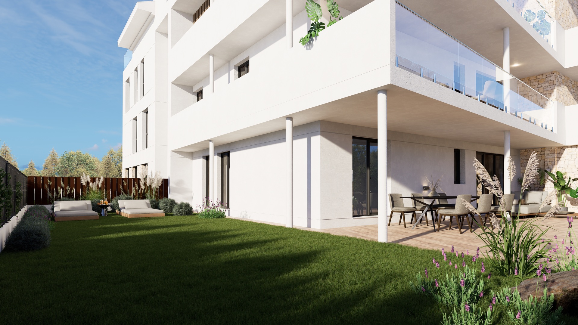 Ground floor apartment featuring a private lawn, a covered terrace with outdoor dining, and a modern white facade with stone accents.