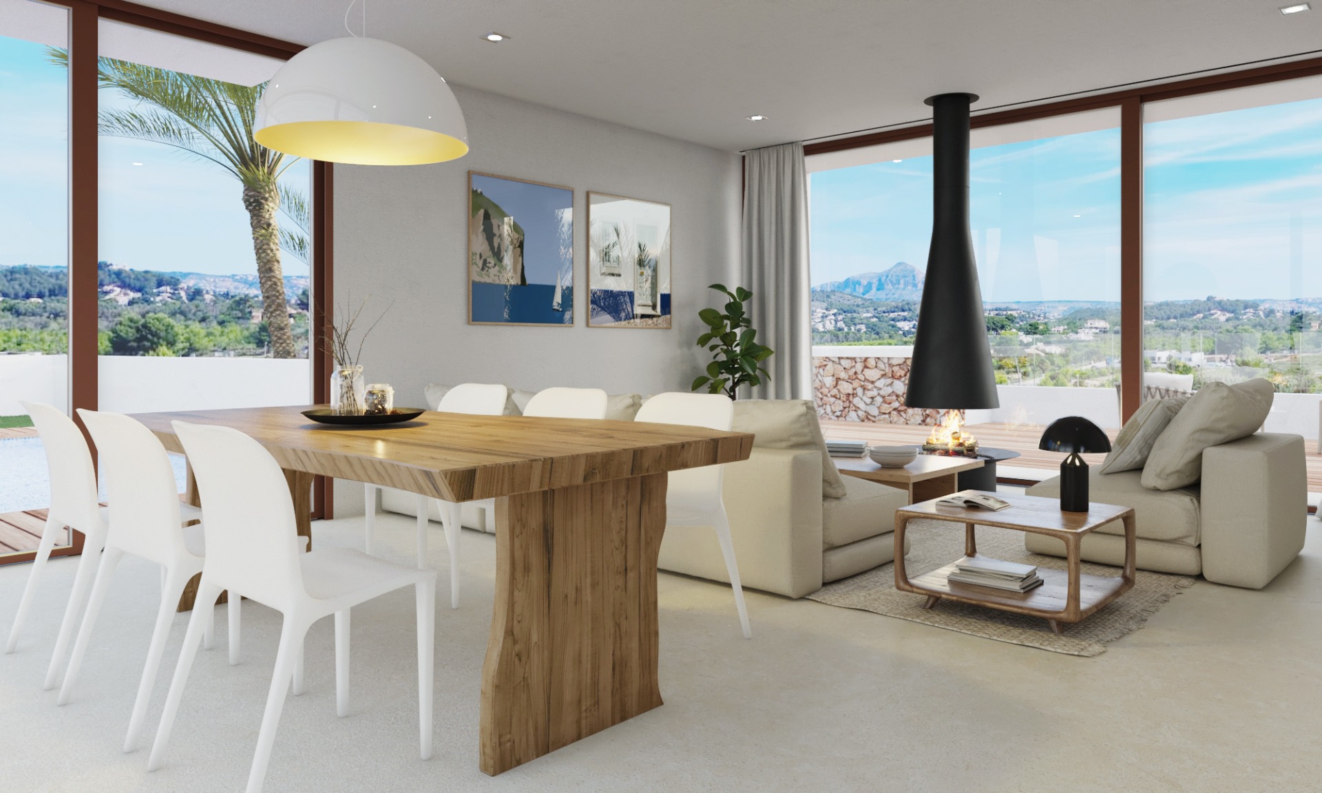 Open-plan living and dining area featuring a solid wood table, a modern suspended fireplace, and floor-to-ceiling windows with views of the Montgó mountain.