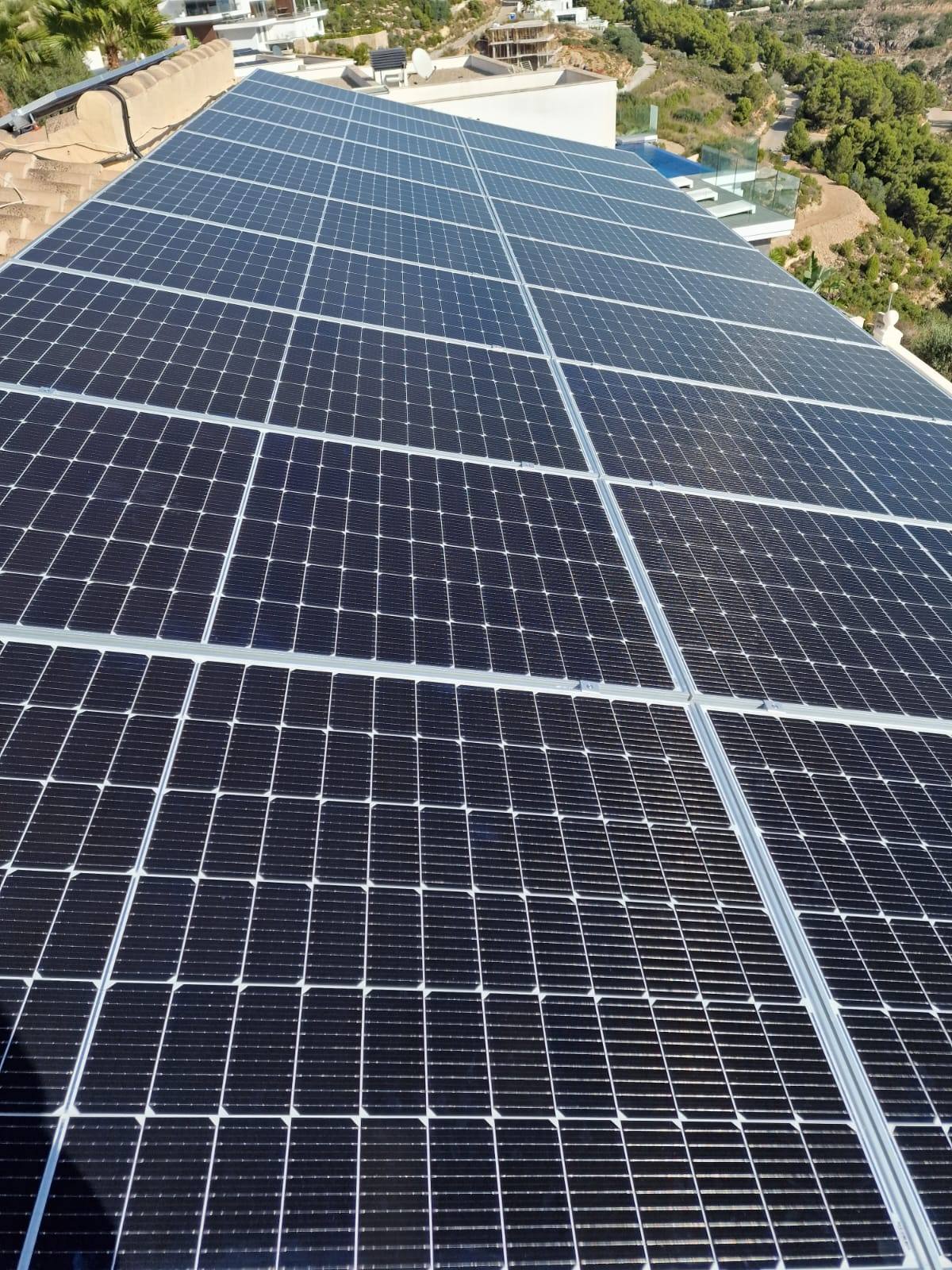 Detailed view of solar panels on the roof, sustainable energy.