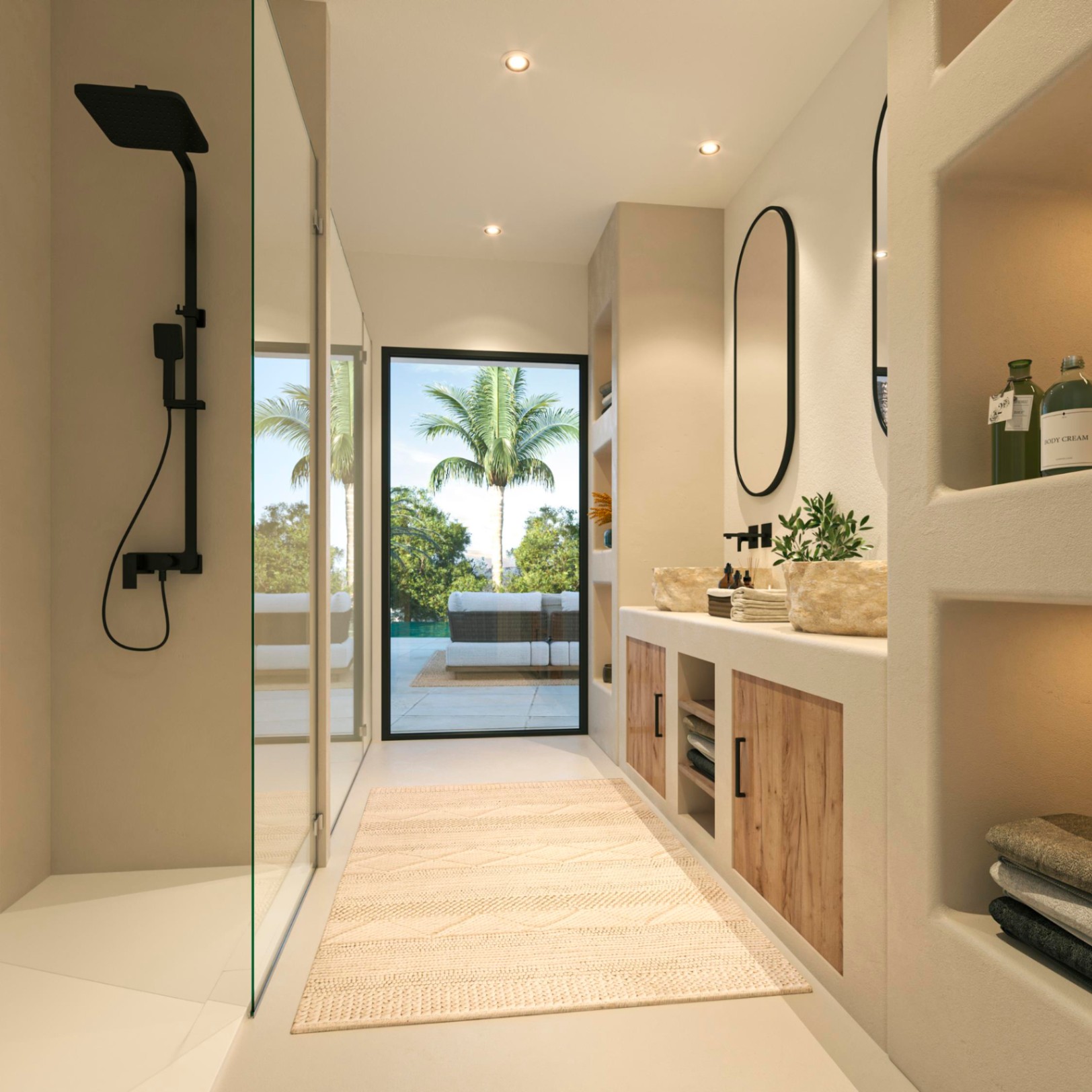 Contemporary bathroom featuring stone basins, matte black fixtures, and a walk-in shower. A floor-to-ceiling glass door connects the space directly to the outdoor terrace.