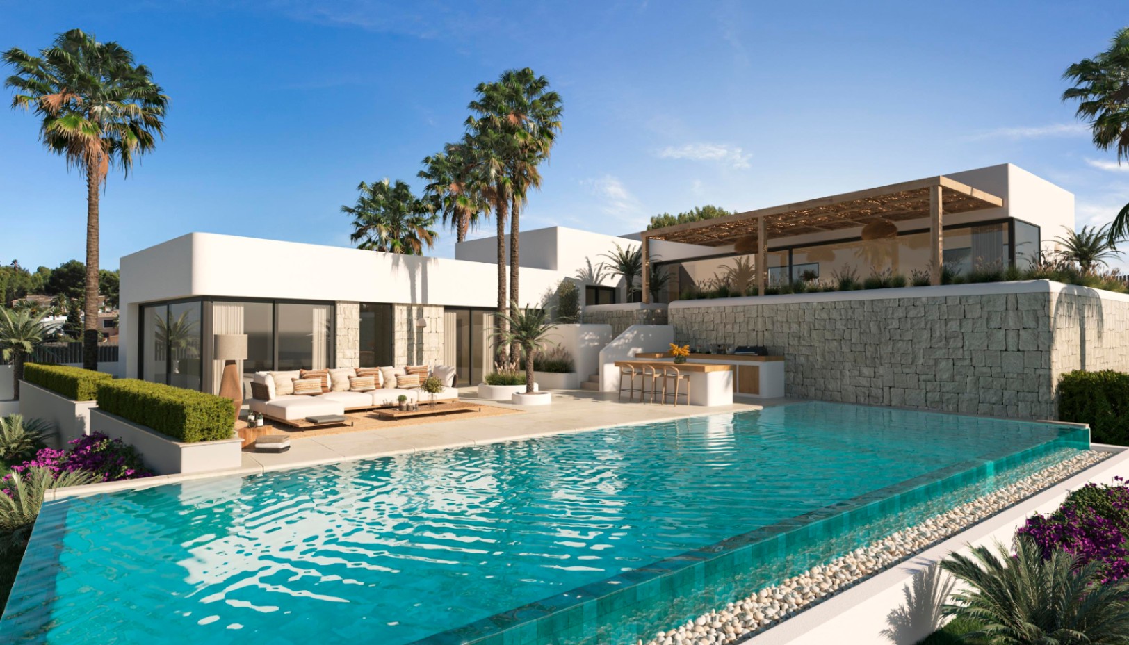 Exterior view featuring an infinity pool with glass edging, a spacious lounge terrace, and a built-in outdoor kitchen set against natural stone walls.