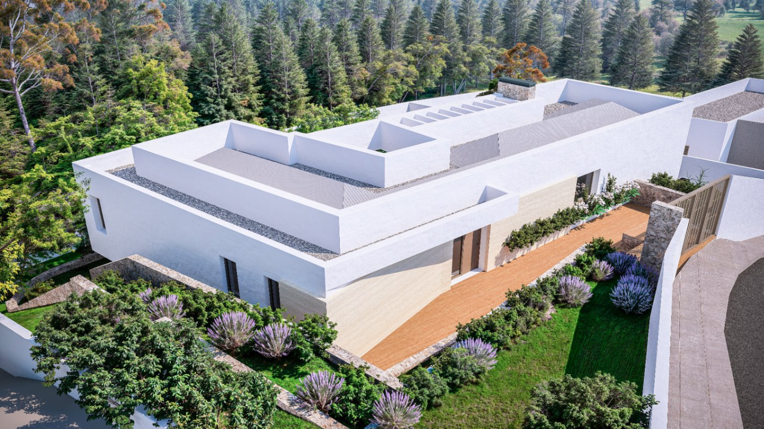 Aerial view of the modern villa featuring white facades, stone accents, and a landscaped garden with lavender, bordered by a dense pine forest.